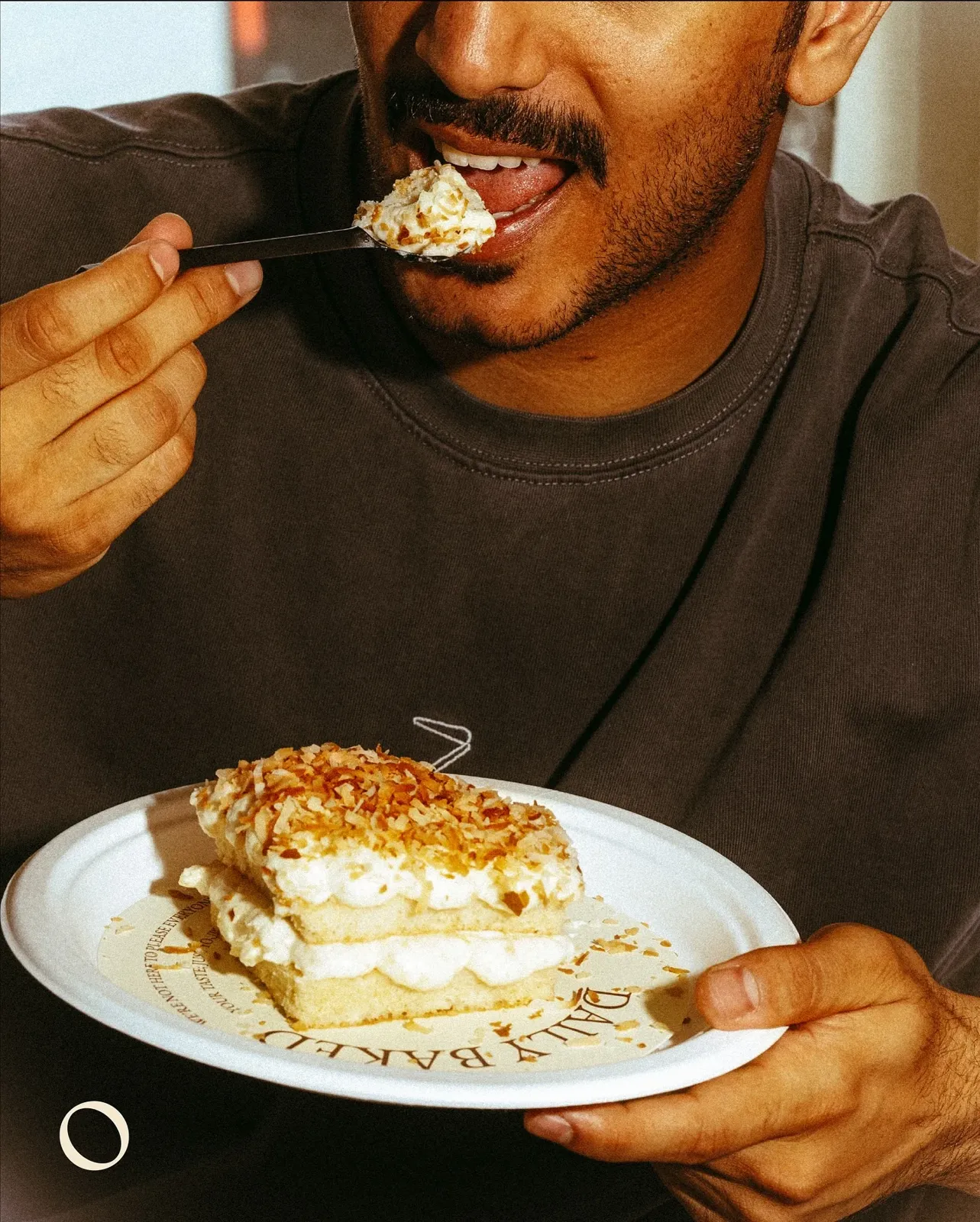 A guest enjoying a slice of OPINION mille-feuille